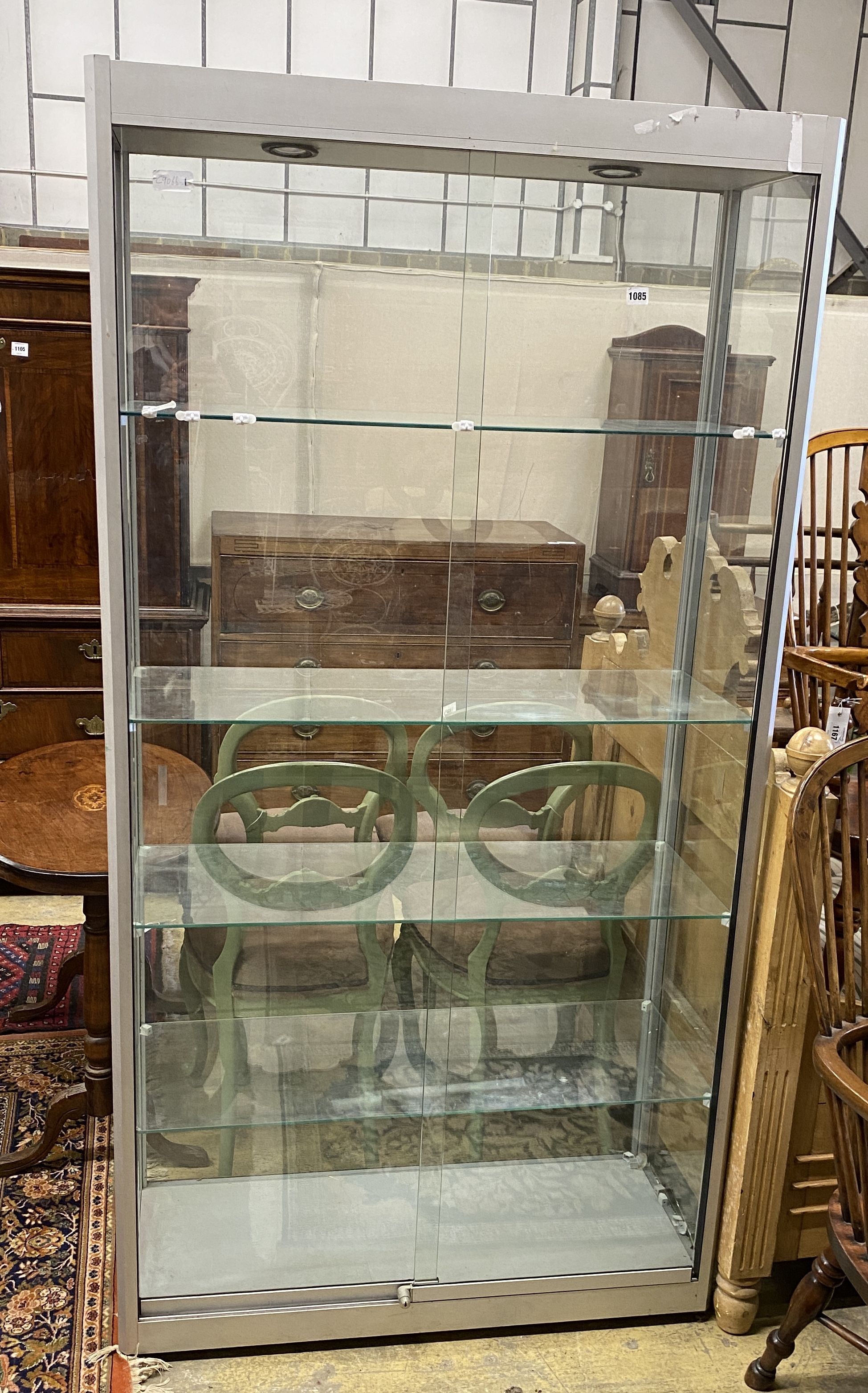 A modern glazed shop cabinet a.f., width 100cm, depth 40cm, height 191cm